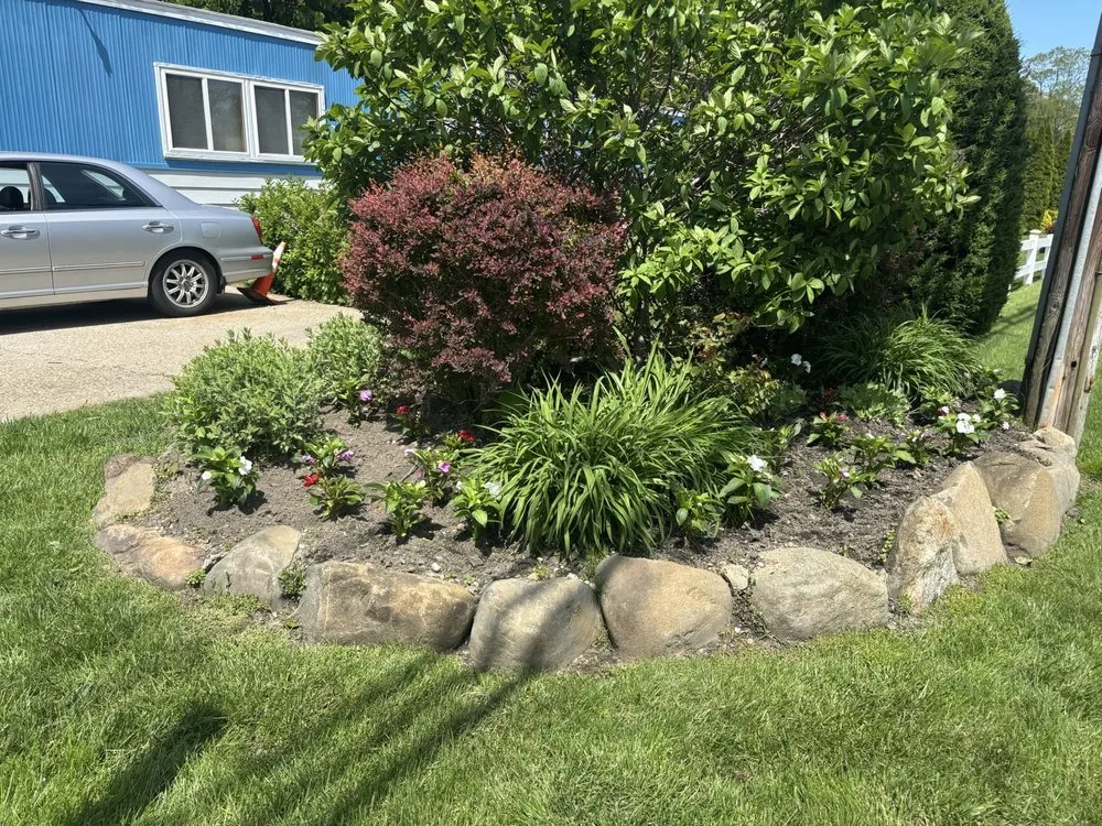 Custom landscape installation in Southampton, NY by De Rosas Landscaping