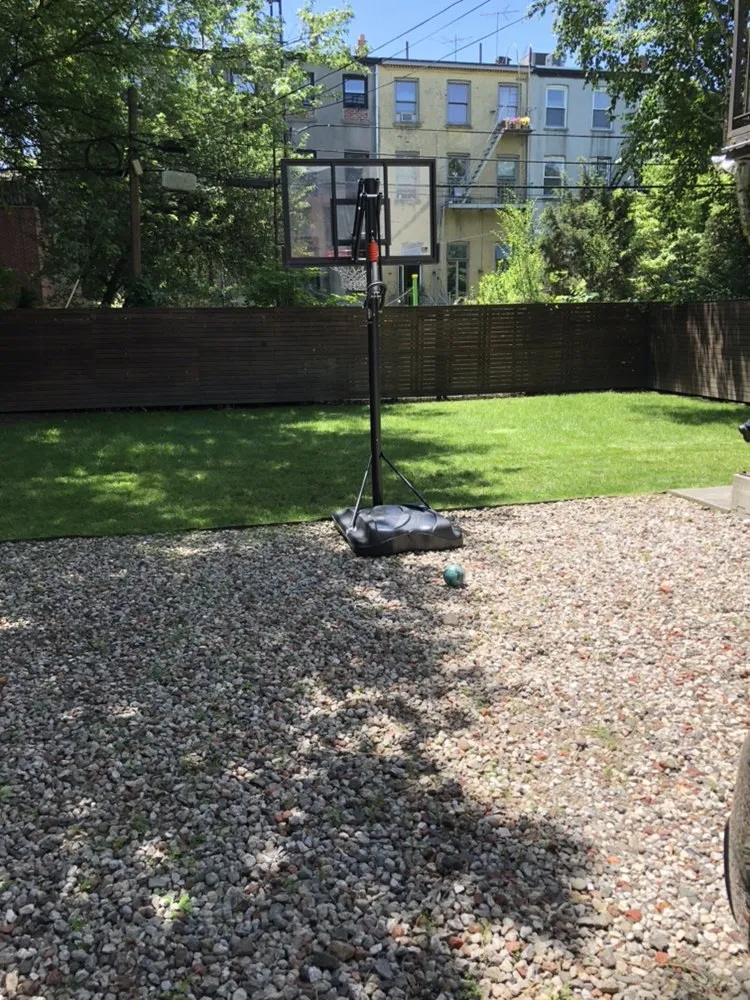 Expert lawn mowing service for year-round maintenance in Brooklyn, NY by De Santo Landscaping & Irrigation