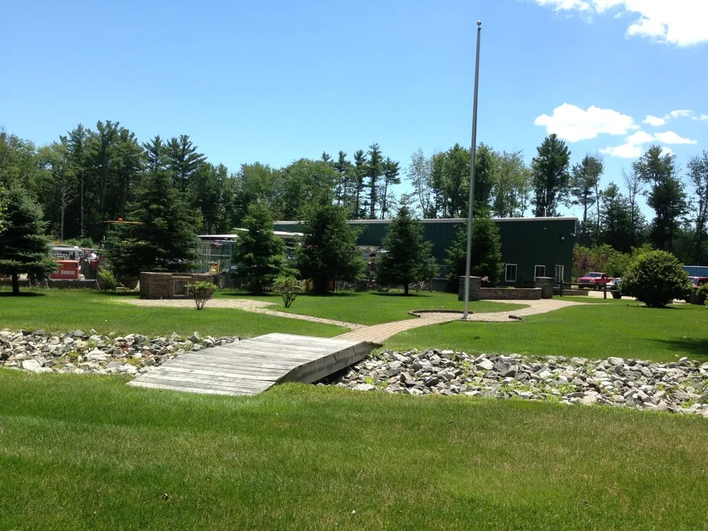Custom landscape installation with custom design across Wells, ME - Dean C Ramsdell Landscaping