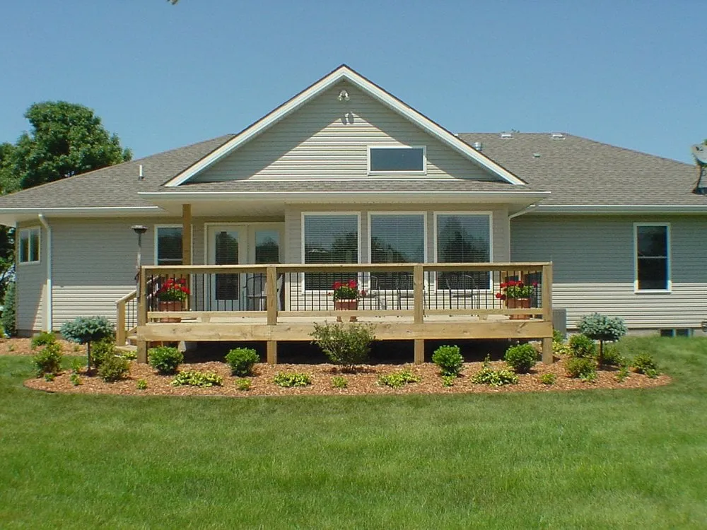 Custom landscape design for outdoor upgrades in Cleveland, MO by Debbie's Lawn Busters