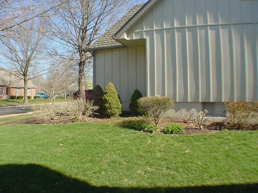 Reliable outdoor landscaping with custom design in Cleveland, MO by Debbie's Lawn Busters