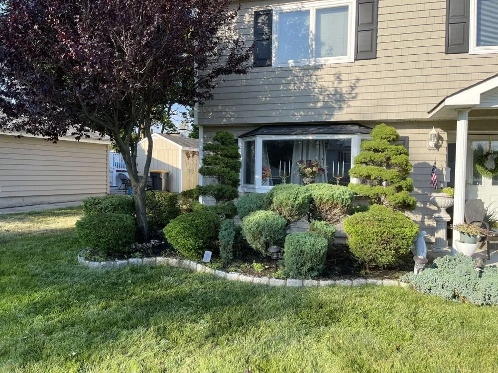 Custom landscape installation in Old Bridge, NJ by Dechert Landscape