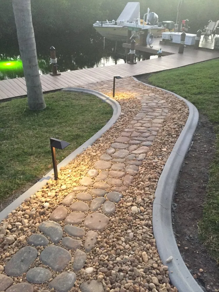 Local yard cleanup service for residential properties across Port Charlotte, FL - Decorative Concrete Curbing & Landscaping
