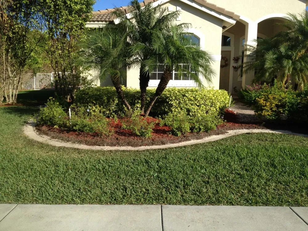 Affordable landscape design for residential properties in Lake Worth, FL by Decorative Landscape Borders Inc