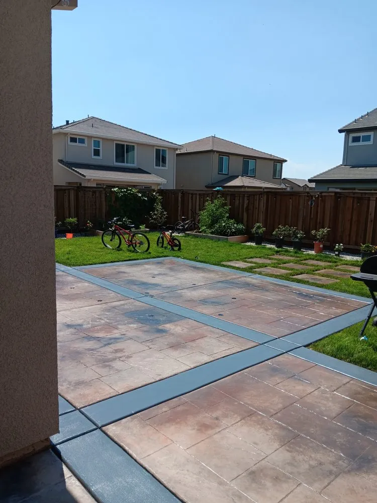 Professional landscape installation in Stockton, CA - Decorative rock & concrete