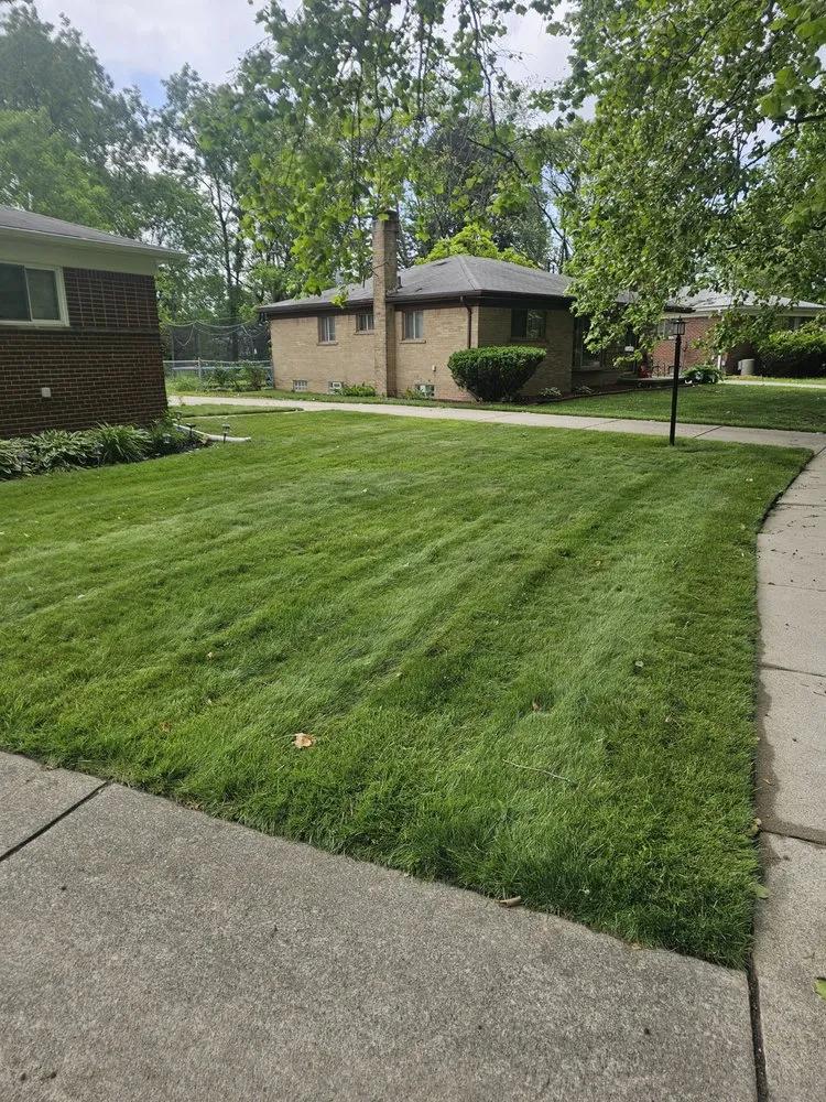 Professional outdoor landscaping for homes in Redford, MI by Dee Nice Lawn Service