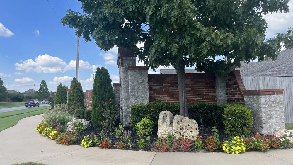 Trusted lawn mowing service in Tulsa, OK by DeeDees Bloomers Landscape & Design