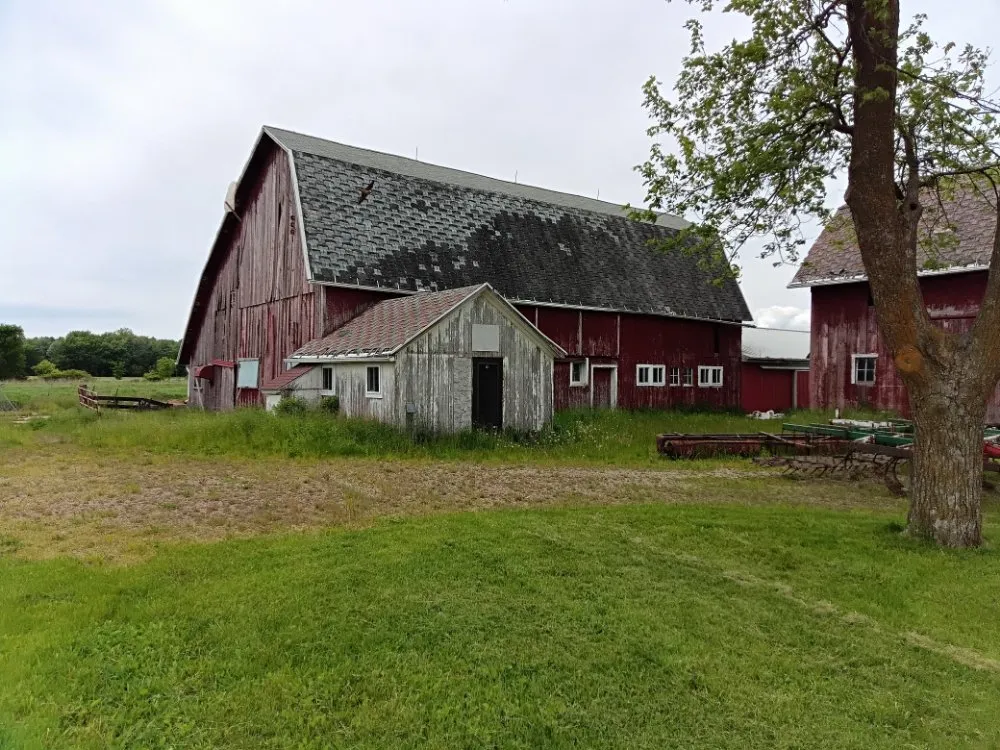 Expert landscaping services for residential properties in Corunna, MI by Definite Landscaping