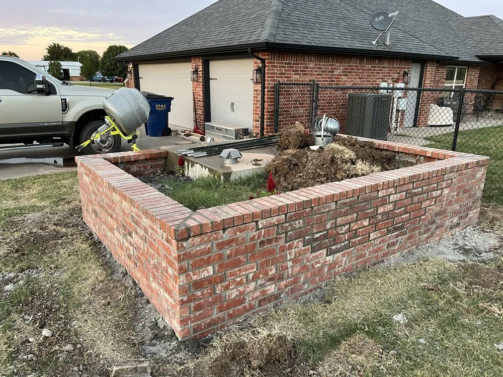 Reliable yard cleanup service for beautiful yards in Oklahoma City, OK by DeHart Landscape and Masonry