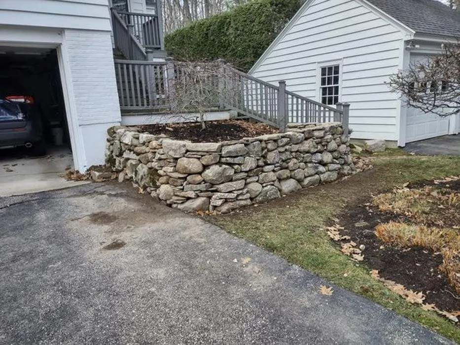 Custom lawn mowing service with custom design in Concord, NH by DeJohn Landscaping