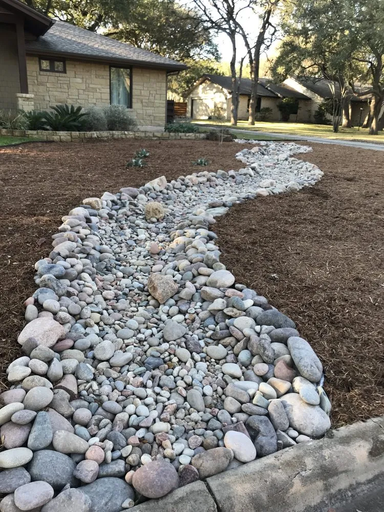 Custom landscape installation for homes in Del Valle, TX by Del Valle Landscape and Maintenance
