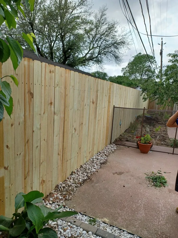 Custom yard cleanup service with custom design across Houston, TX - Delarca Fence Installation & Repair Services