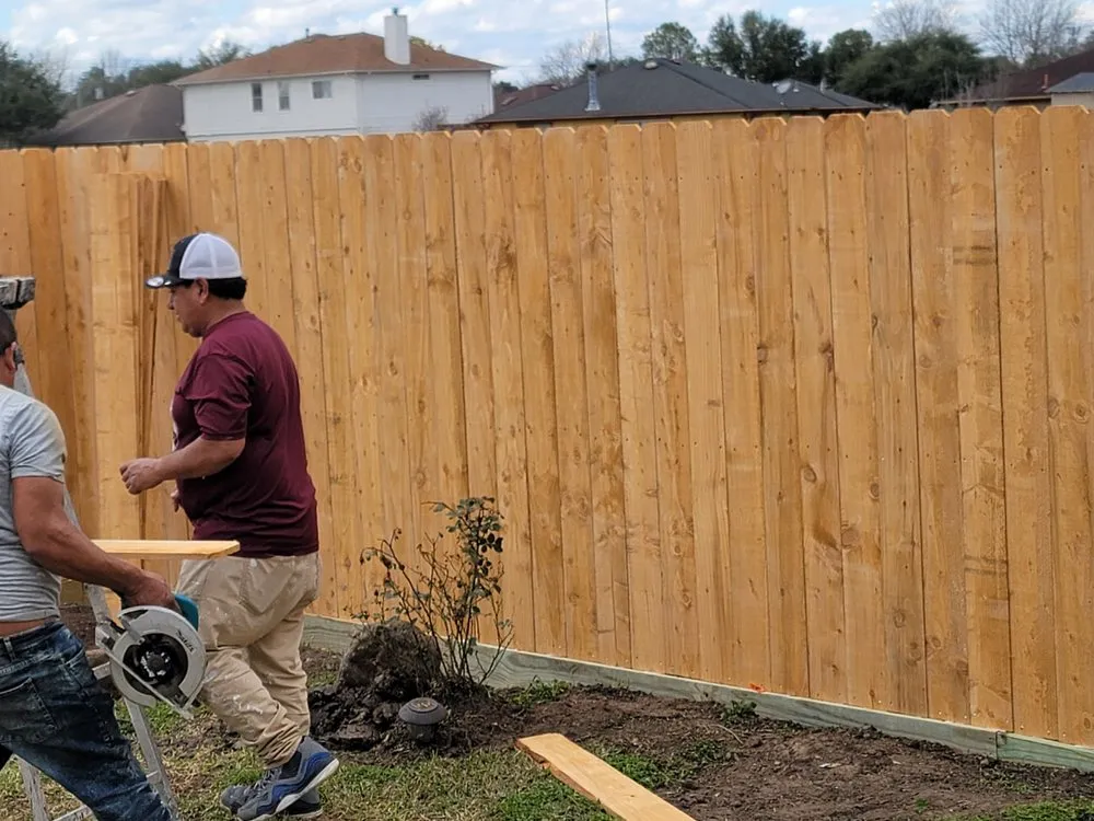 Affordable lawn mowing service for homes across Houston, TX - Delarca Fence Installation & Repair Services