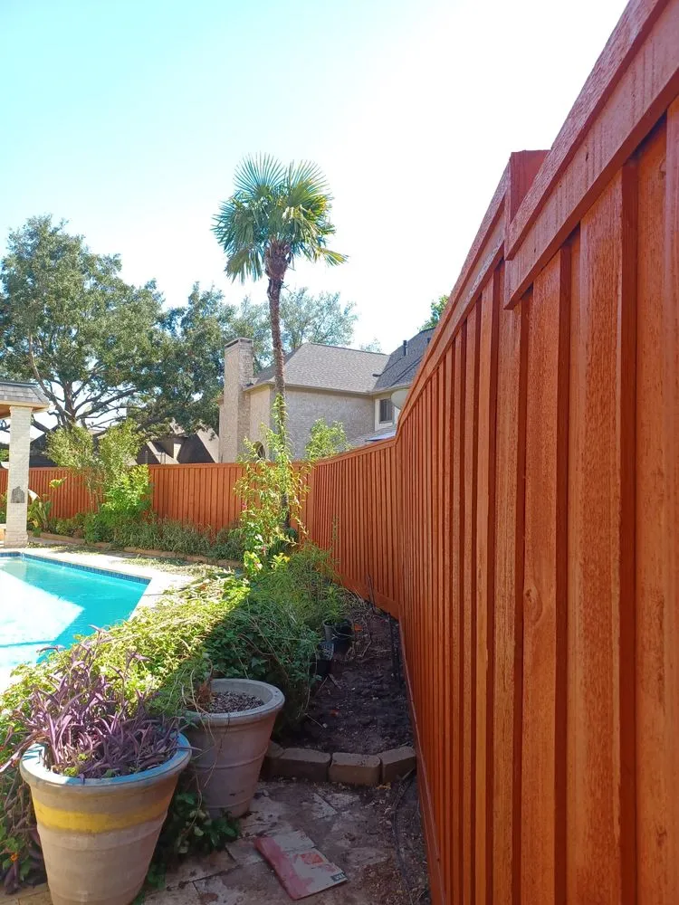 Custom landscape design in Houston, TX by Delarca Fence Installation & Repair Services