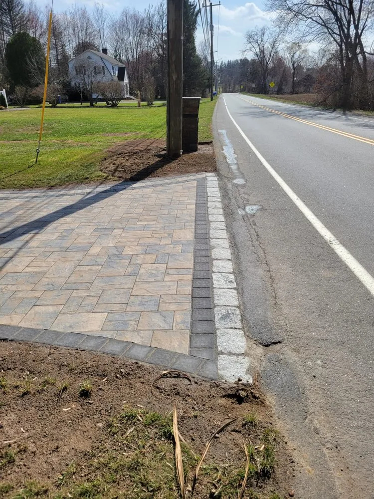 Professional yard maintenance with custom design across Springfield, MA - Deleon Hardscapes