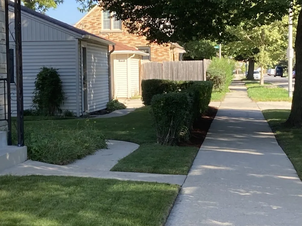 Expert garden landscaping for year-round maintenance in Milwaukee, WI by Delgado Lawn Care Company & More