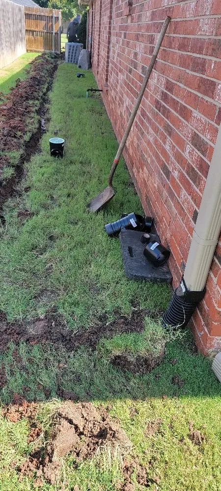 Professional outdoor landscaping with custom design in Newcastle, OK by DeLoera Total Lawncare