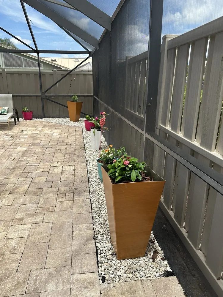 Custom outdoor landscaping in Stuart, FL by DeLongs Arbor Care