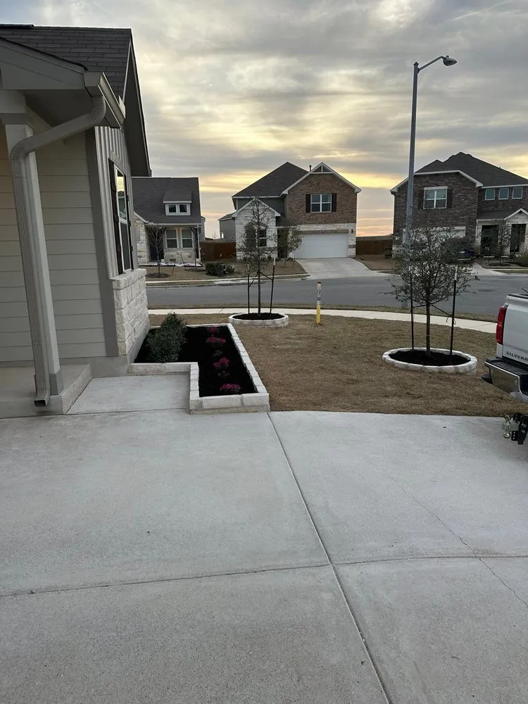 Top-rated outdoor landscaping in Buda, TX by Deluxe Lawn Care Services