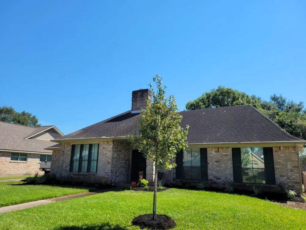 Affordable lawn mowing service for homes in Cypress, TX by Deluxscapes