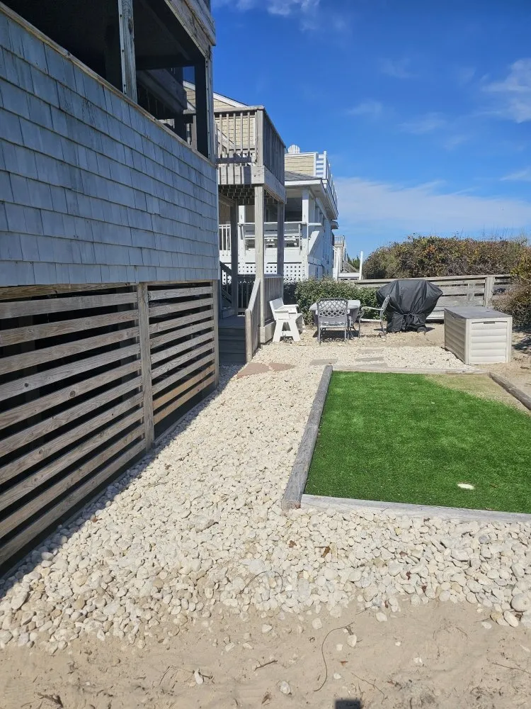 Local lawn care service for residential properties in Powells Point, NC by Delvale’s Services