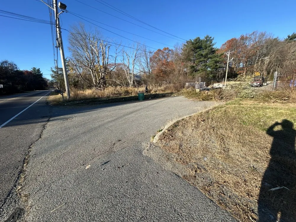 Local yard cleanup service for homes in East Taunton, MA by DeMatos Landscaping