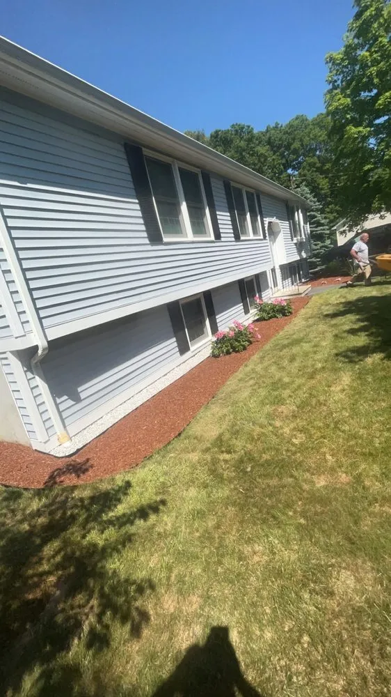Professional lawn mowing service with custom design across East Taunton, MA - DeMatos Landscaping