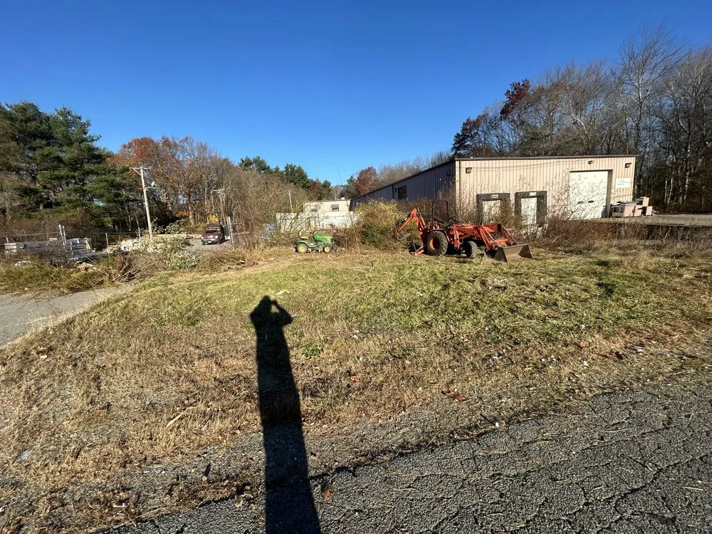 Custom yard cleanup service for year-round maintenance in East Taunton, MA by DeMatos Landscaping