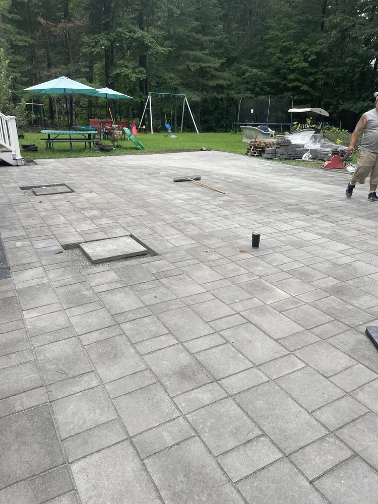 Affordable lawn care service for residential properties in Lancaster, MA by Demeulles Tree and Landscaping