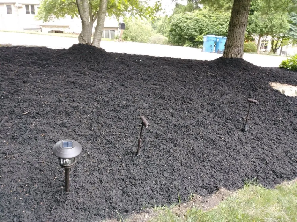 Custom garden landscaping for residential properties in Columbus, OH by Deneil's Lawn Service