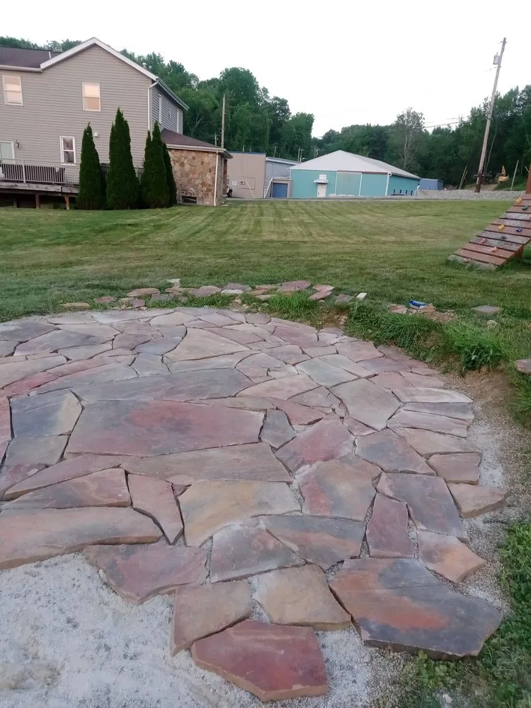 Custom yard cleanup service for year-round maintenance in Greensburg, PA by Denley Industries