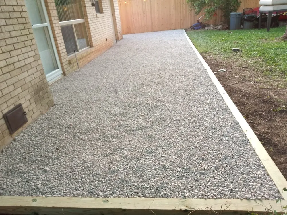 Affordable landscape design for residential properties in Buda, TX by Dennis Trees service