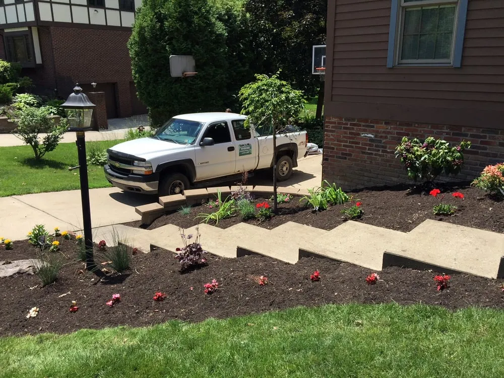 Professional landscaping services for residential properties in Pittsburgh, PA by Dependable Lawn Services