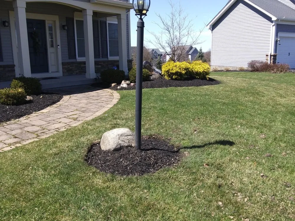Professional outdoor landscaping for year-round maintenance across Geneva, NY - DeRaddo Lawn Care Services