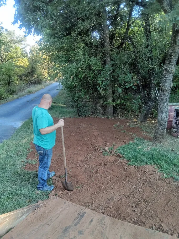 Custom outdoor landscaping for homes in Marlow, OK by Derk's Tree Lawn and Garden's