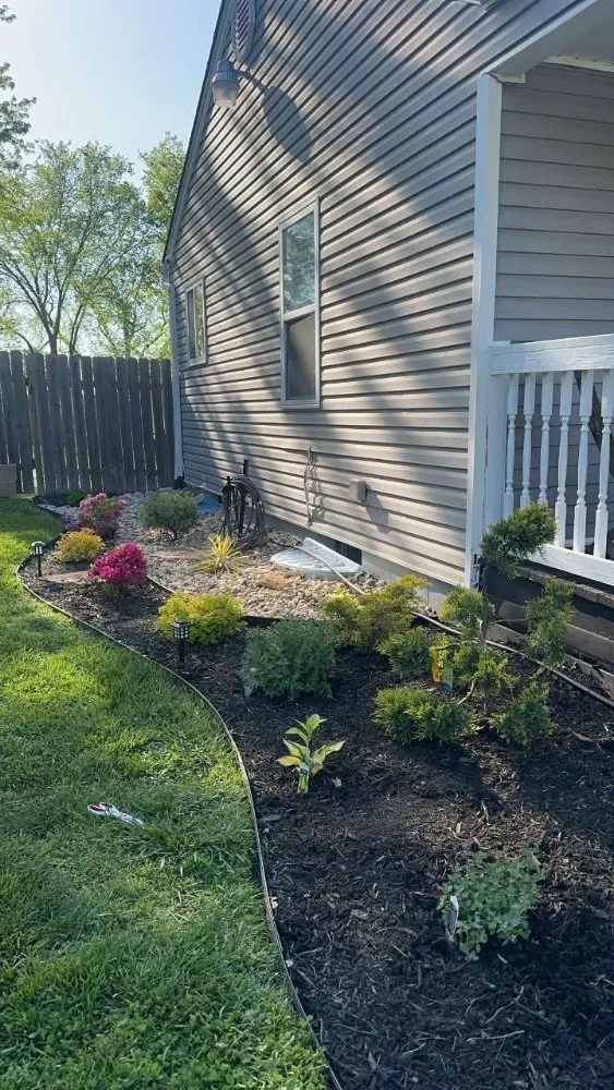 Custom outdoor landscaping near you in Kansas City, MO by DeRocher's Lawn Salon