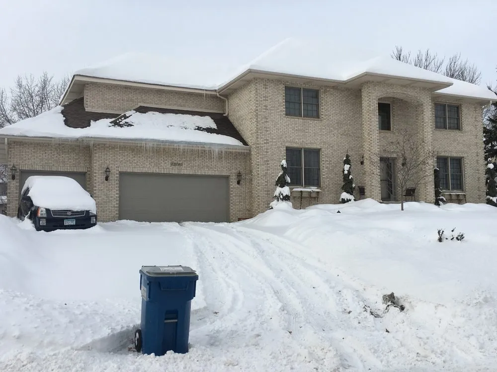 Affordable landscape design for beautiful yards in Minneapolis, MN by Derrell's Lawn Care & Snow Removal Service