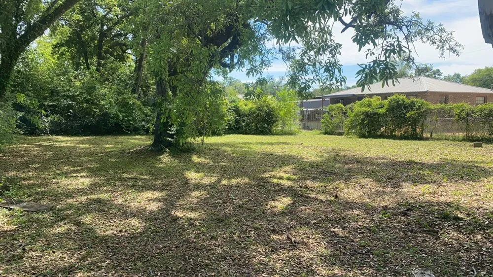 Professional outdoor landscaping for homes in Pensacola, FL by Derrick Smith Jr Lawn Care Service