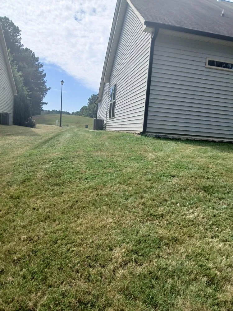 Custom lawn mowing service for year-round maintenance across Louisburg, NC - Derrick Smith