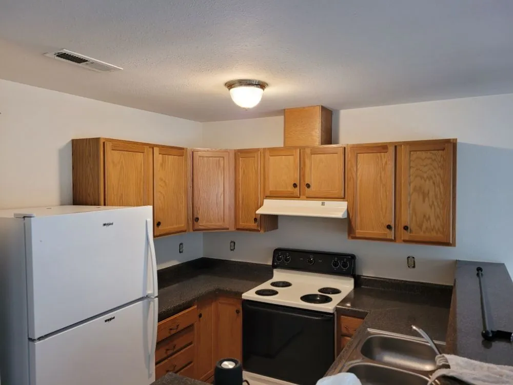 Professional lawn care service for residential properties across Florissant, MO - Derrickson Construction