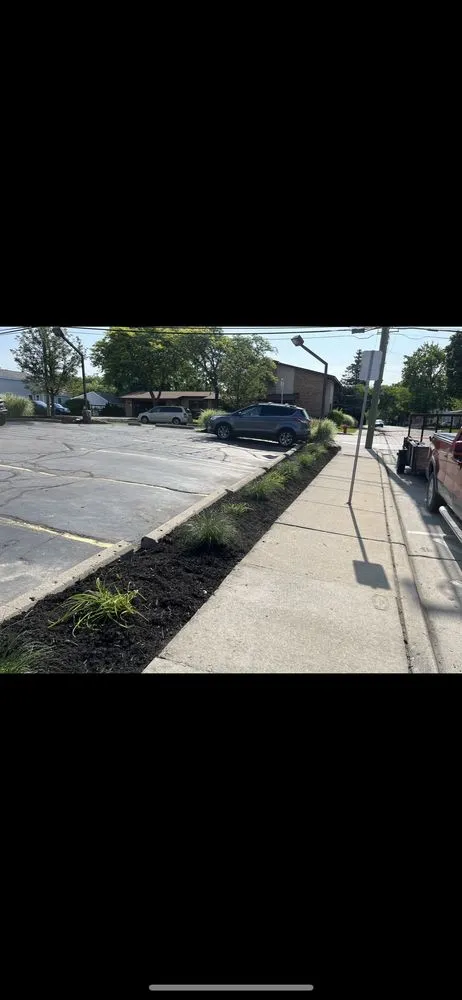 Trusted lawn mowing service in Plymouth Charter Township, MI by DeSantis Landscape