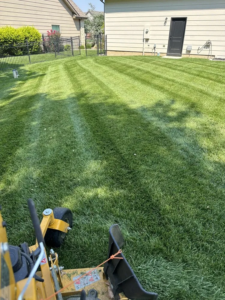 Affordable yard maintenance in Maize, KS by Desco Lawn Care