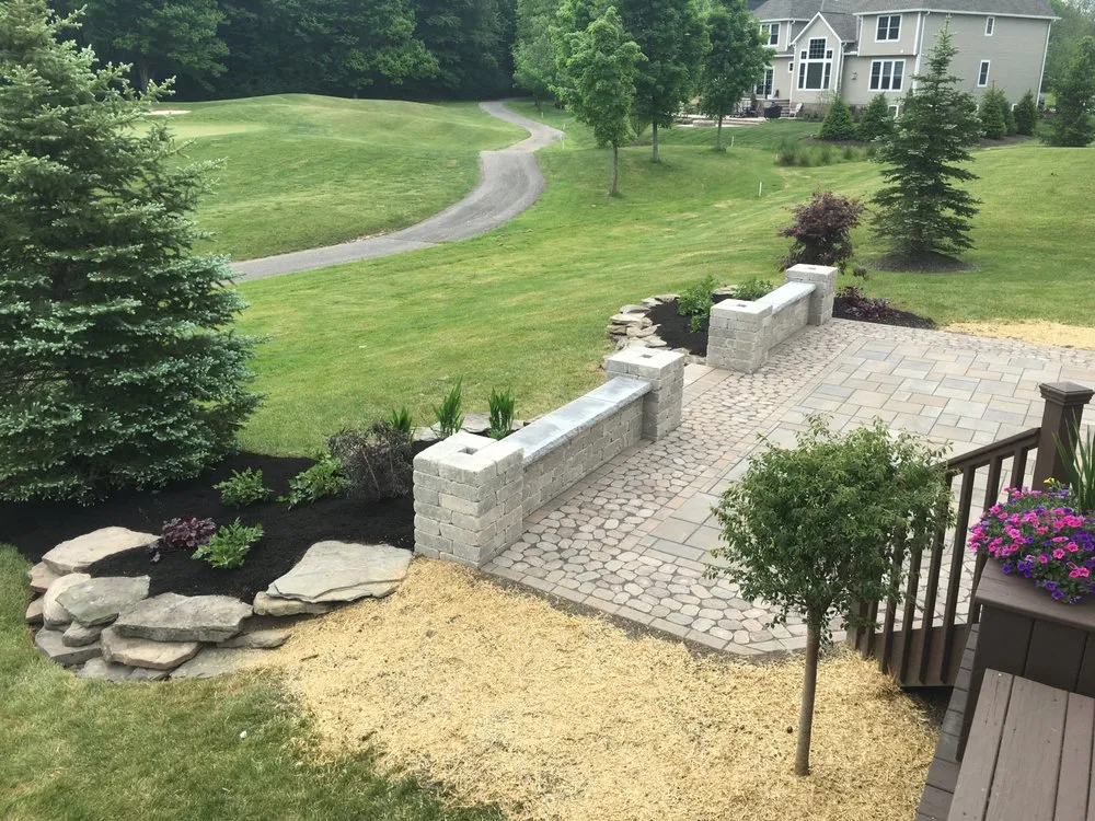 Local yard cleanup service for year-round maintenance in Euclid, OH by Design 2