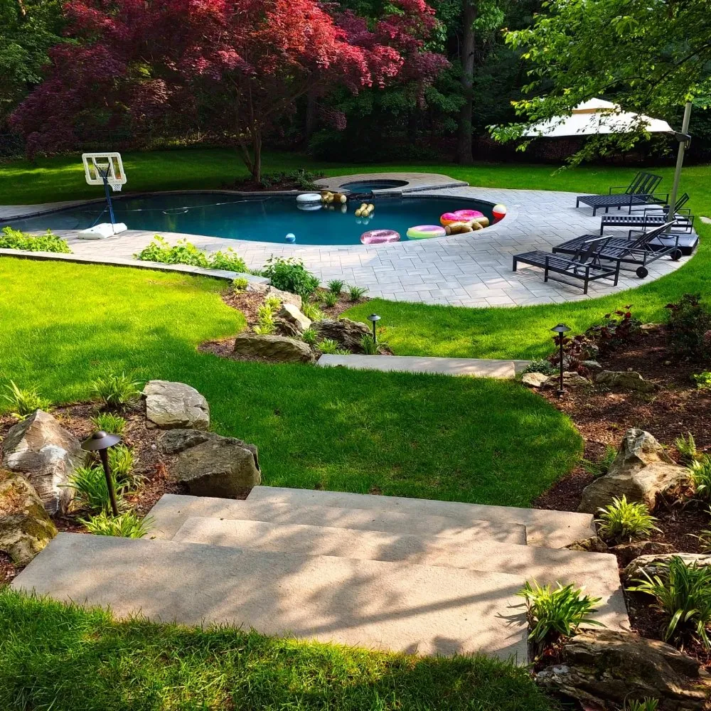 Reliable lawn mowing service experts serving Massapequa, NY - Design and Build Landscape