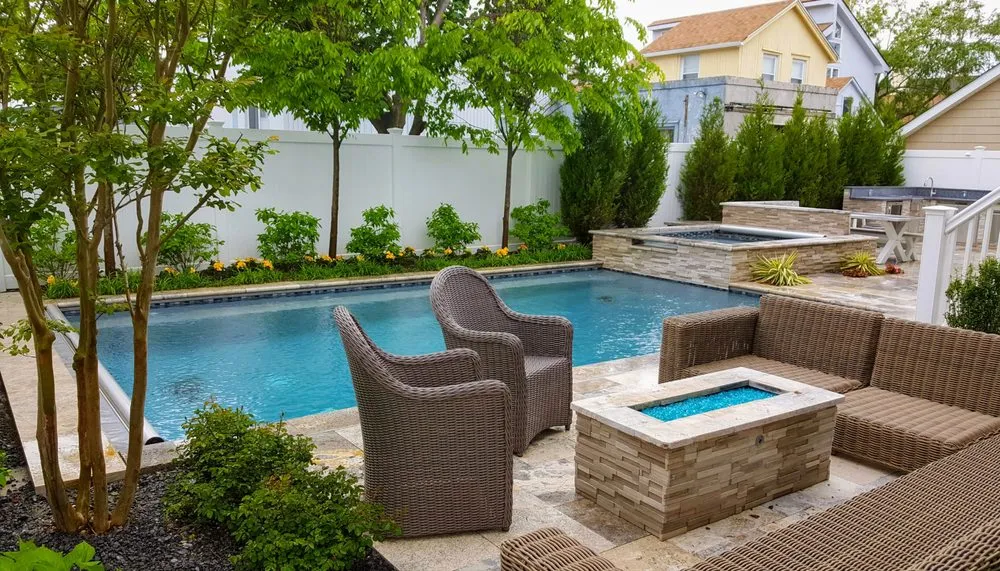 Expert landscape installation for year-round maintenance across Massapequa, NY - Design and Build Landscape