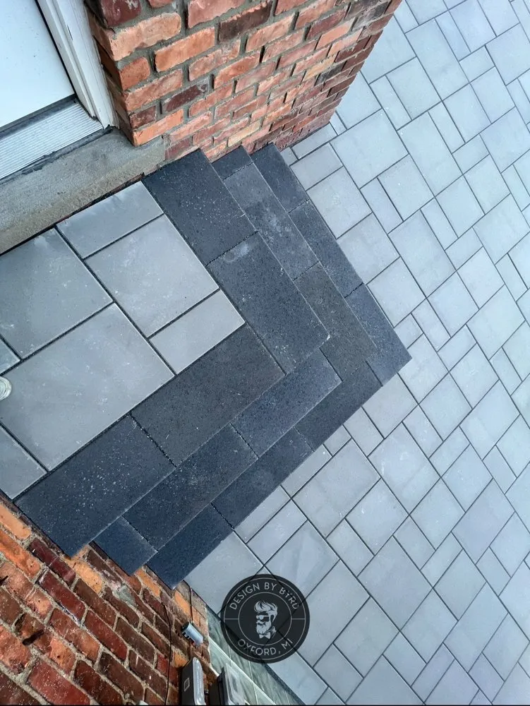 Affordable yard cleanup service experts serving Oxford, MI - Design by Byrd