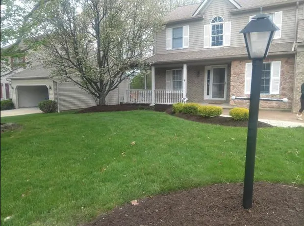 Affordable garden landscaping in Shaker Heights, OH by Design IZ Minz Landscape & Demolition