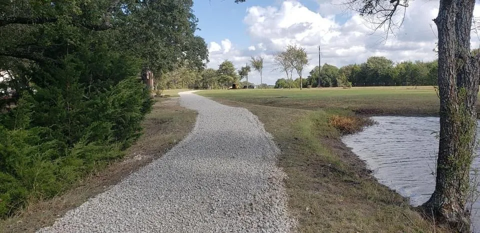 Custom yard cleanup service for residential properties in Rockwall, TX by Design Masters Sand and Gravel