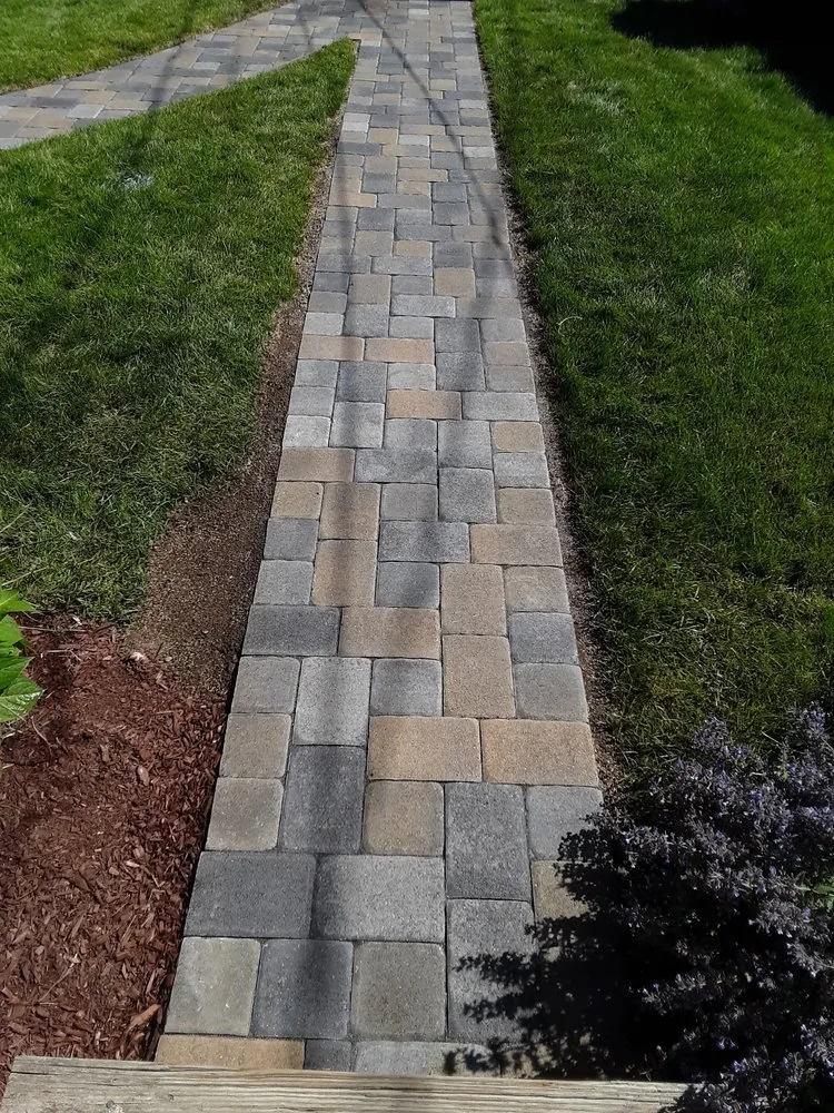 Custom yard cleanup service in Westbrook, CT by Designer Fence & Stone