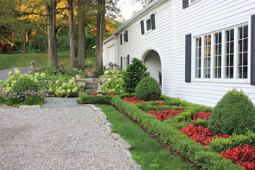 Affordable lawn care service in New Milford, CT by Designing Eden